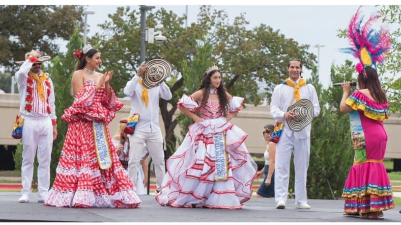 Folkloric dancers in colorful traditional dress performing at the Hispanic Heritage Festival
